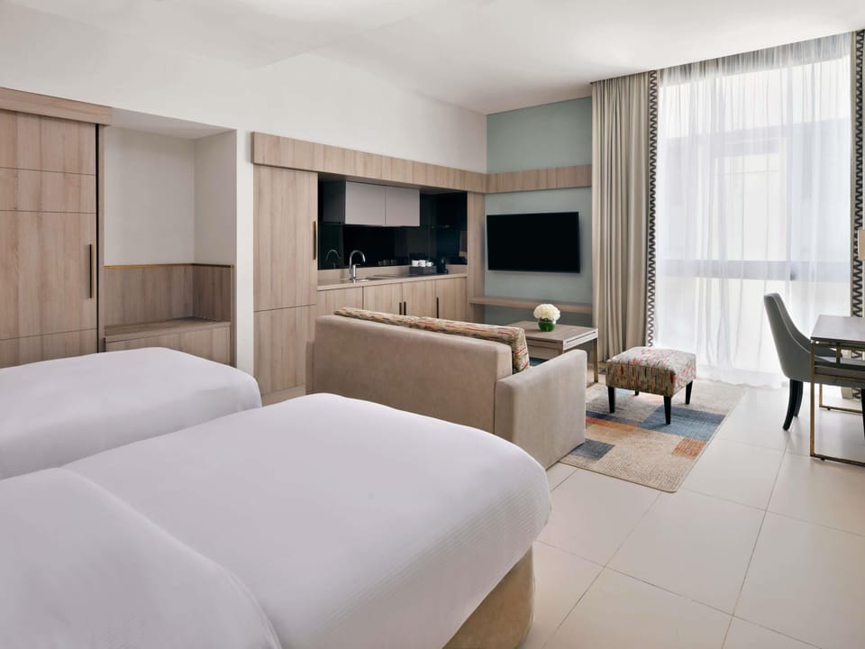 Studio, 2 Twin Beds | Minibar, in-room safe, desk, blackout drapes