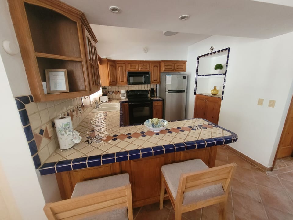 Family Villa, Multiple Beds, Non Smoking | Private kitchen | Full-size fridge, microwave, oven, stovetop