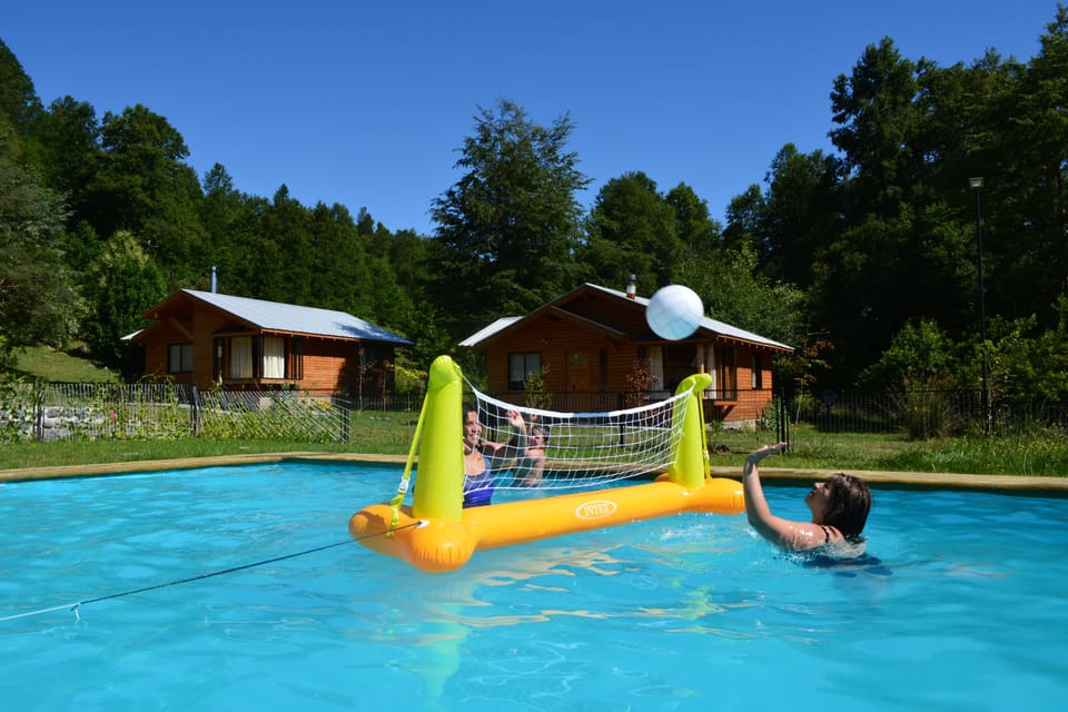 Seasonal outdoor pool, open 9:00 AM to 9 PM, pool umbrellas