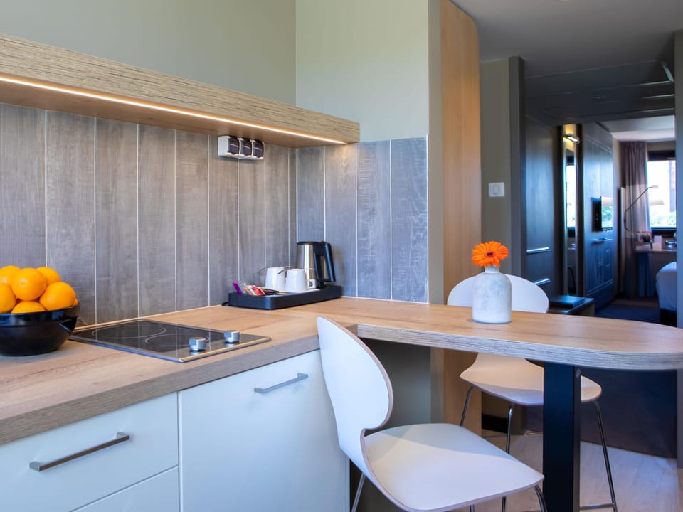 Family Room, Kitchenette | In-room safe, desk, laptop workspace, blackout drapes