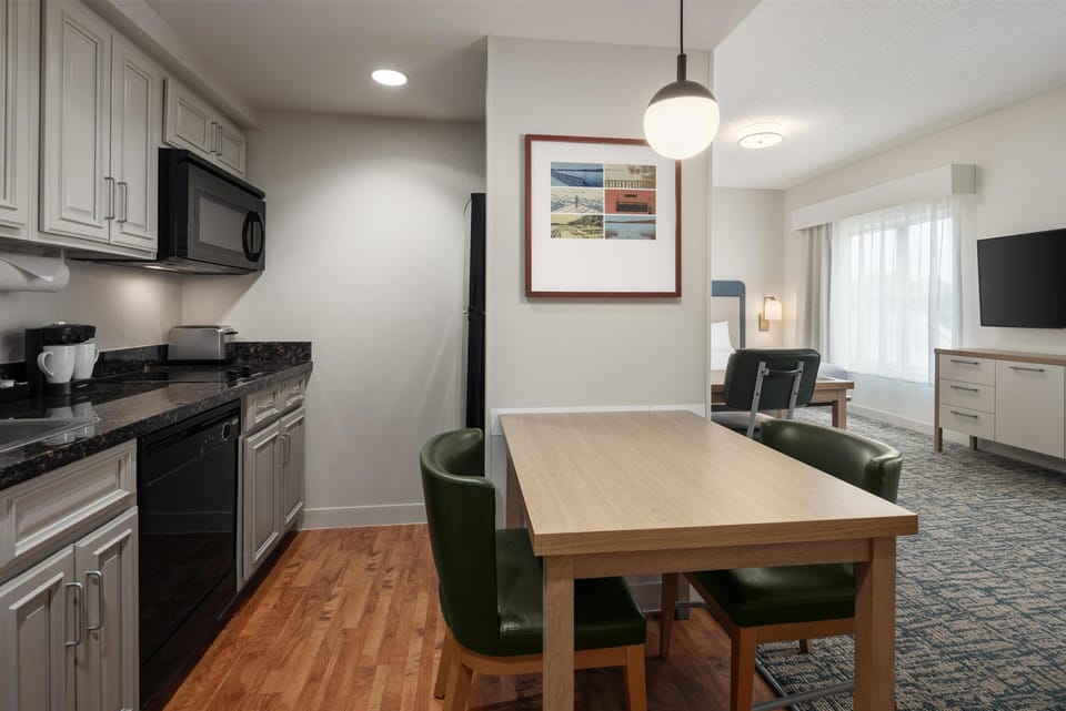 Studio Suite, 1 King Bed, Non Smoking | Private kitchen | Coffee/tea maker, full-size fridge, microwave, stovetop