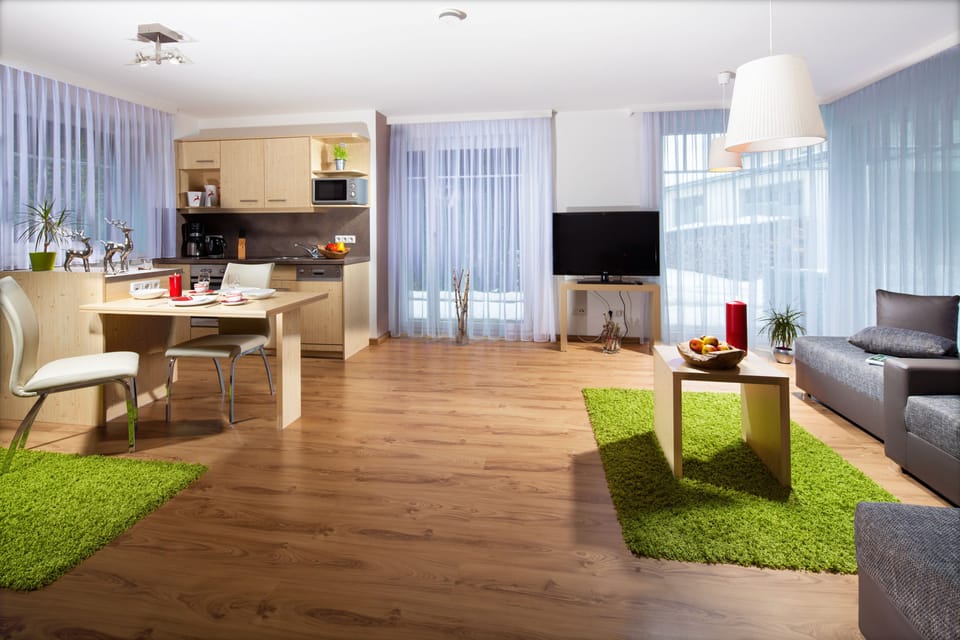 Business Apartment, 1 Bedroom | Living area | Flat-screen TV