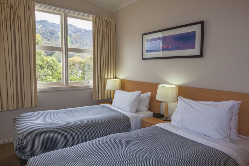 King or Twin Room | Down comforters, desk, iron/ironing board, free WiFi