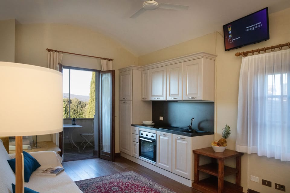 Condo, 1 Bedroom (Bilocale Villa Dini) | Private kitchen | Fridge