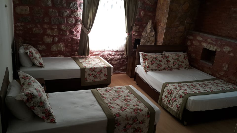 Standard Quadruple Room | Blackout drapes, free WiFi, bed sheets