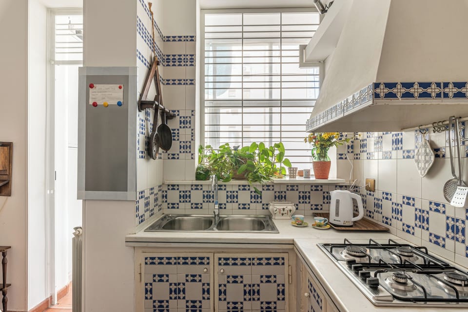 Apartment, 3 Bedrooms | Private kitchen | Full-size fridge, oven, stovetop, espresso maker