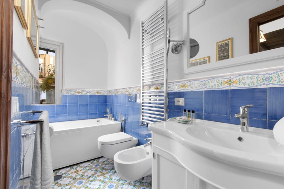 Exclusive Double Room, Non Smoking, Terrace | Bathroom | Shower, free toiletries, hair dryer, slippers
