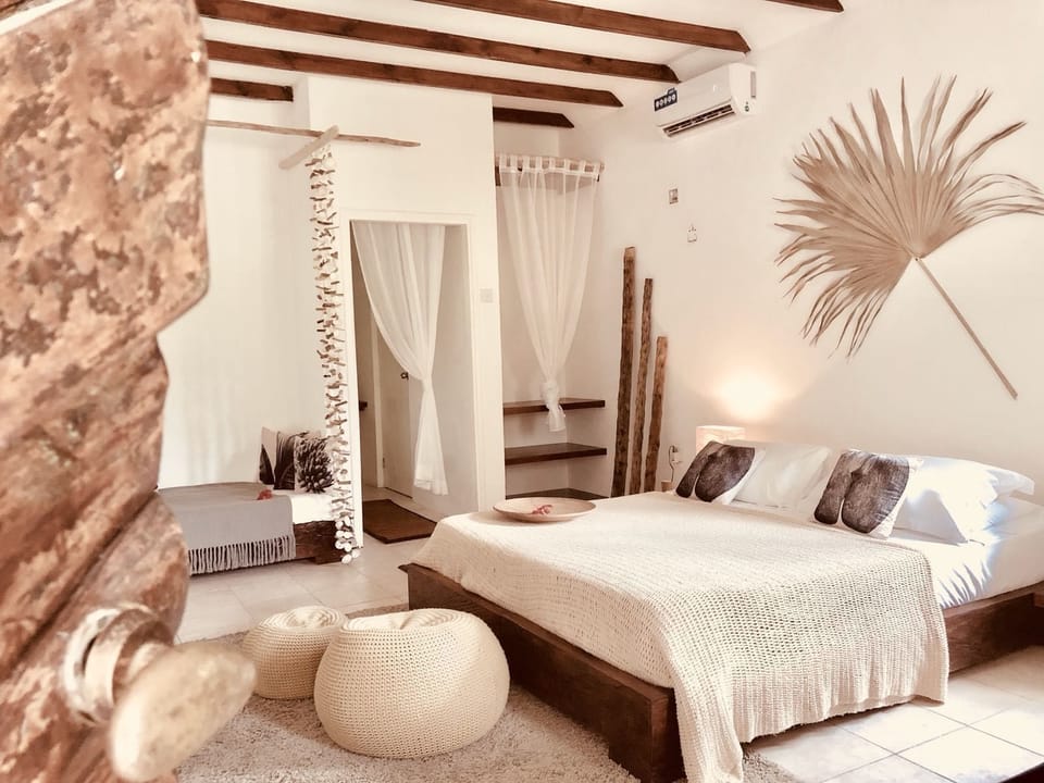 Family Suite Chalet | Minibar, in-room safe, WiFi (free), bed sheets