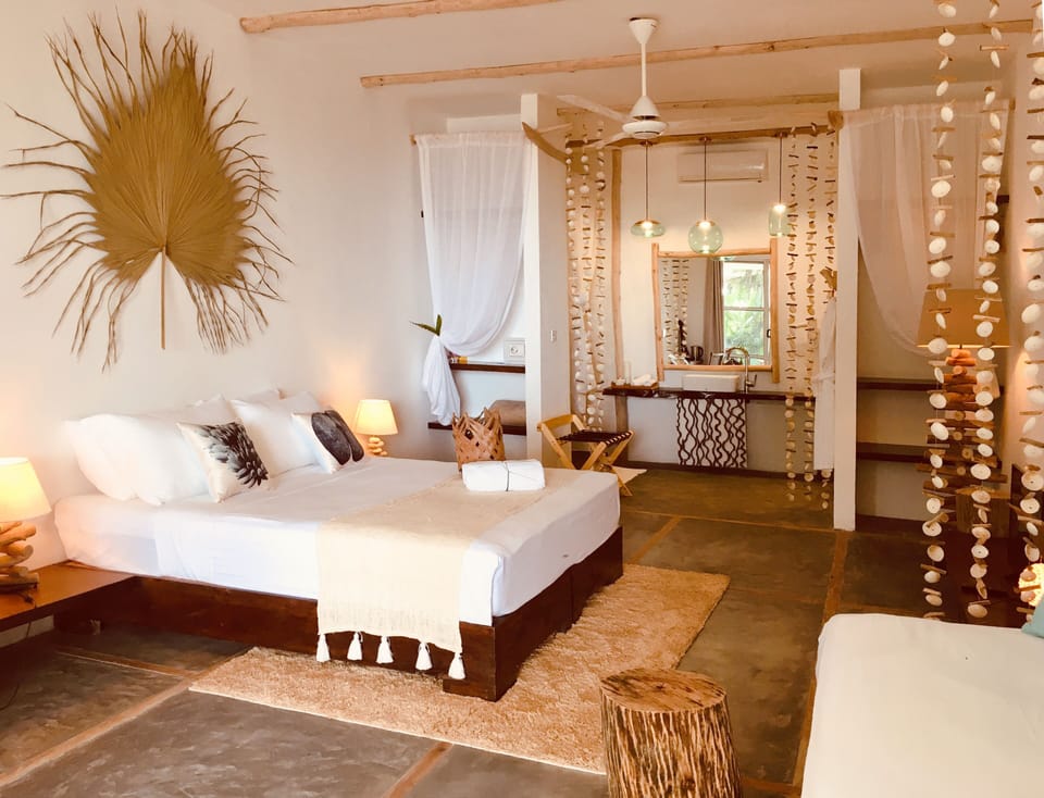 Comfort Double Room, 1 Bedroom, Garden View, Beachfront | Minibar, in-room safe, WiFi (free), bed sheets