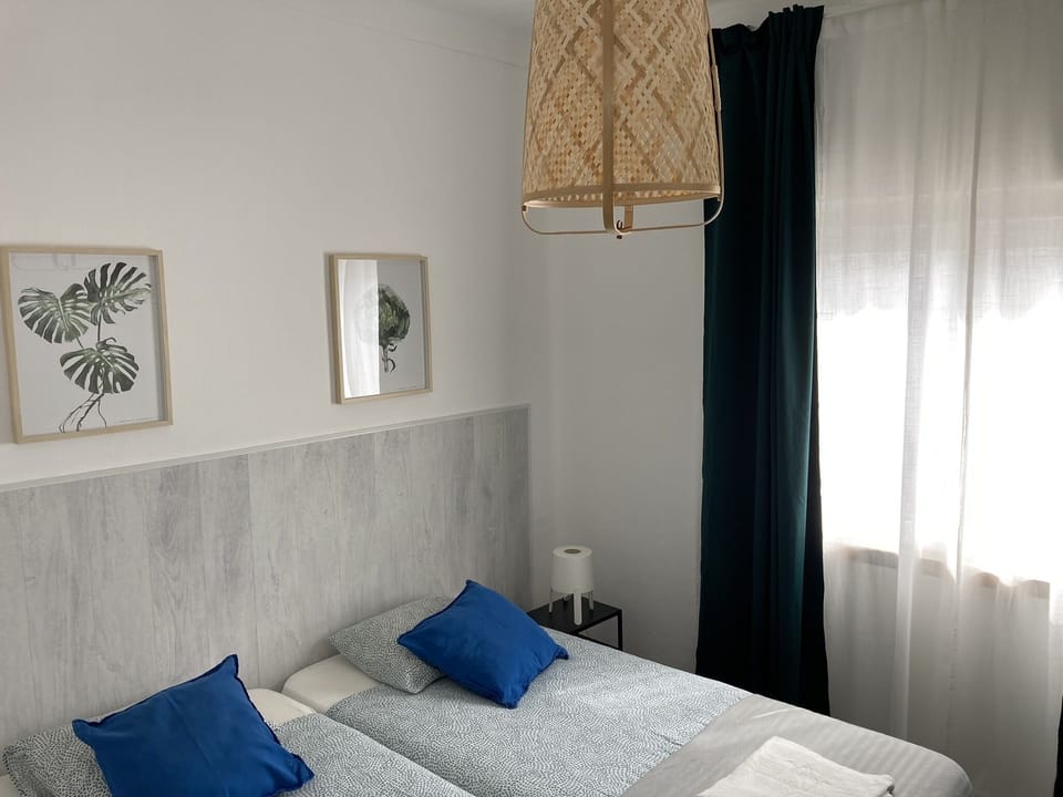 Basic Twin Room, Shared Bathroom | Down comforters, free WiFi, bed sheets