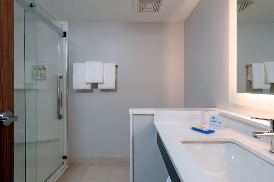 Rainfall showerhead, free toiletries, hair dryer, towels