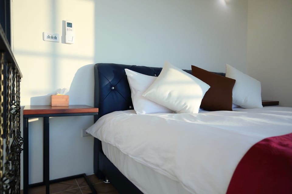 Signature House | Desk, blackout drapes, soundproofing, rollaway beds (surcharge)
