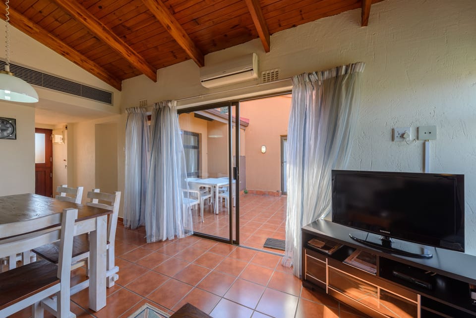 Standard Triple Room, 3 Bedrooms | Living room | Flat-screen TV, table tennis