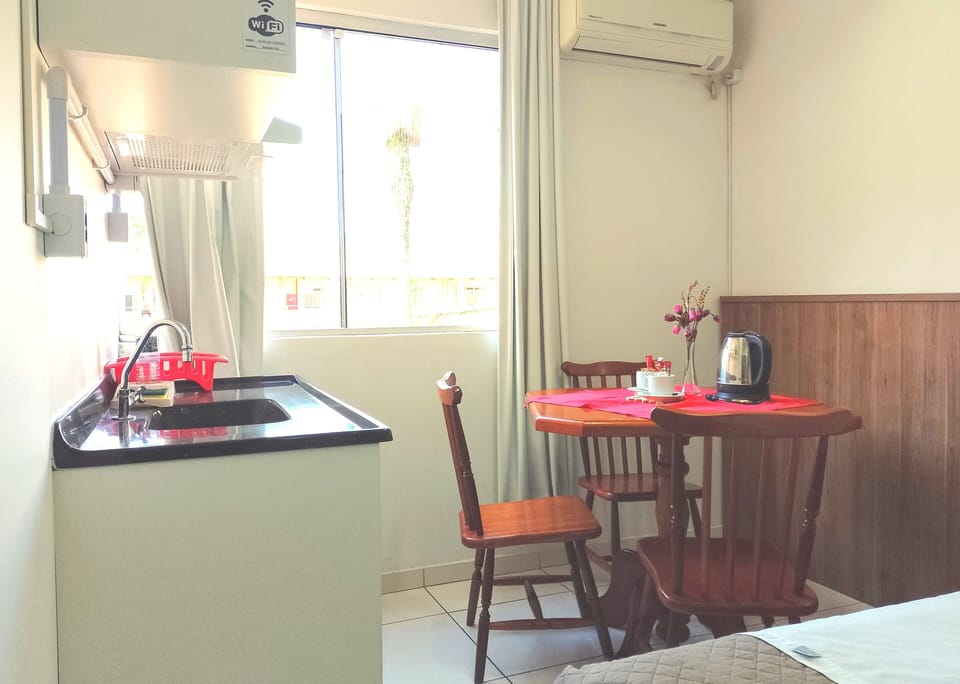 Superior Quadruple Room | Private kitchen | Fridge