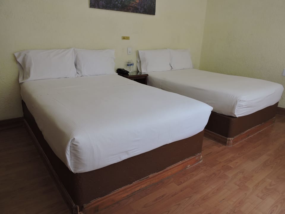 Quadruple Room, Non Smoking | Free WiFi, bed sheets