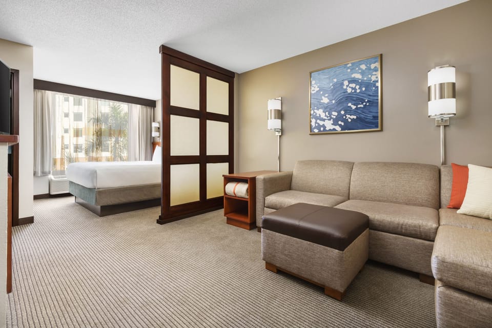 Down comforters, pillowtop beds, in-room safe, desk