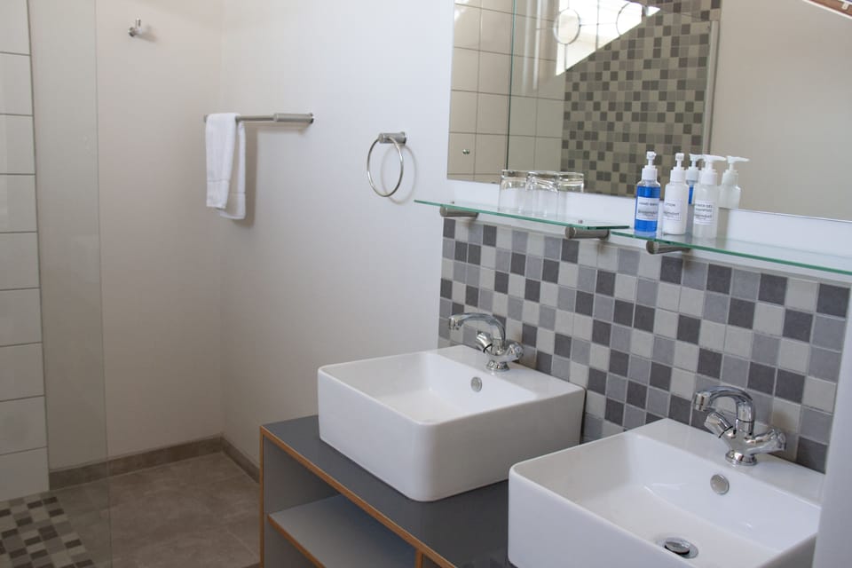 Family Triple Room | Bathroom | Shower, rainfall showerhead, hair dryer (on request), towels