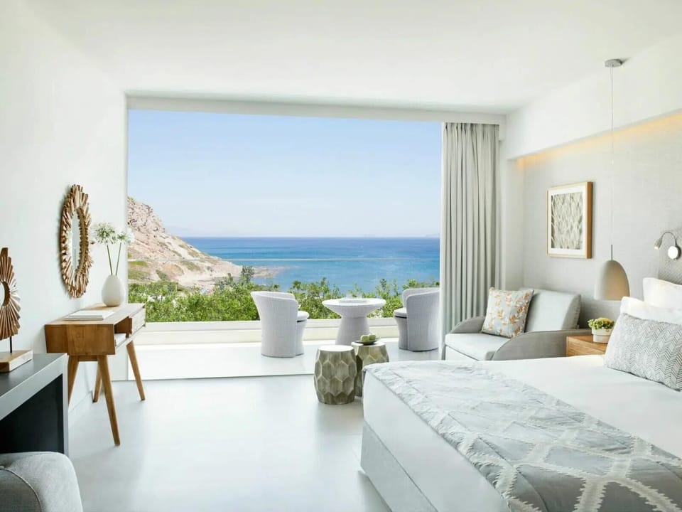 Superior Triple Room, Partial Sea View | Premium bedding, free minibar, in-room safe, blackout drapes