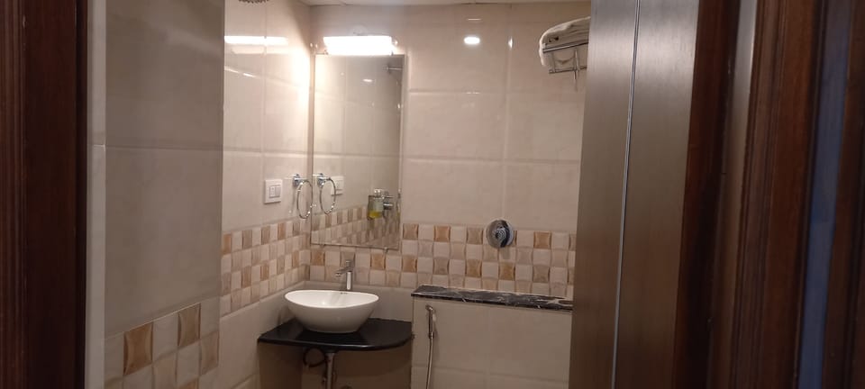 Standard Room, 1 Double Bed, Accessible, Smoking | Bathroom | Shower, rainfall showerhead, free toiletries, bathrobes