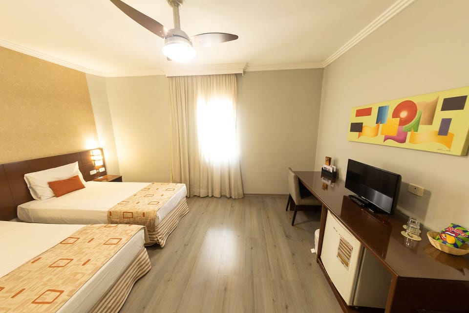Superior A Solteiro Terreo | Minibar, desk, blackout drapes, free WiFi