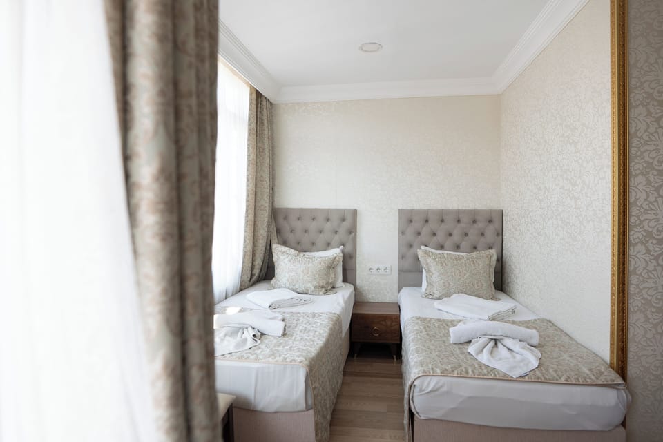 Superior Quadruple Room | Premium bedding, Select Comfort beds, minibar, in-room safe