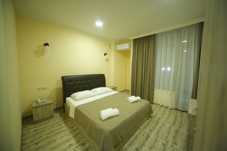 Standard Double or Twin Room | Minibar, desk, soundproofing, rollaway beds