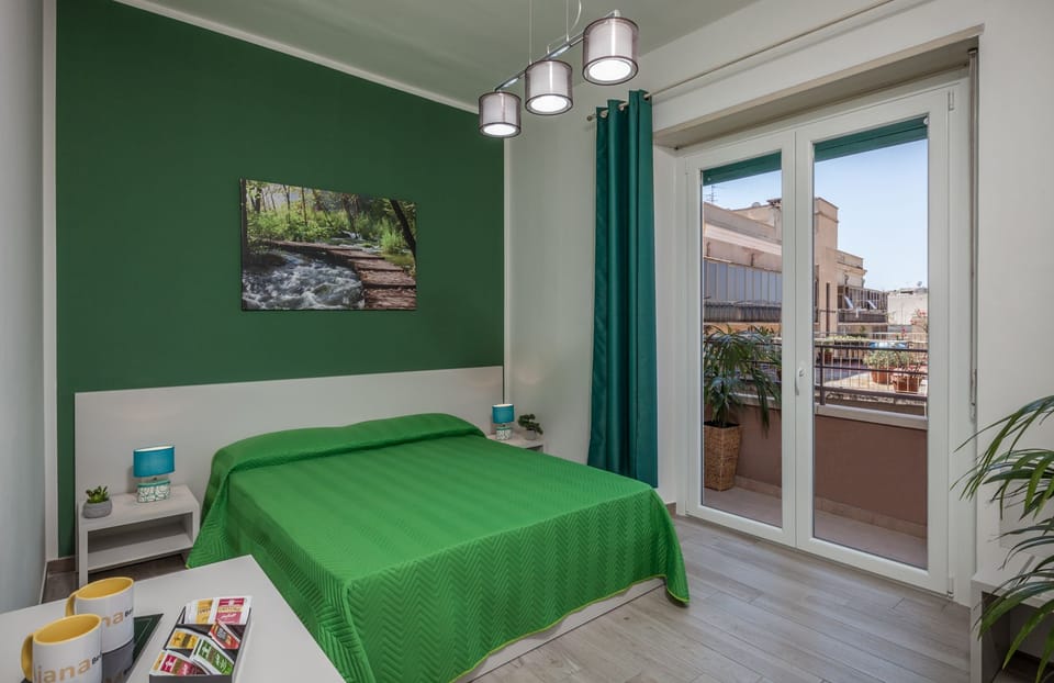 Family Double Room, 1 Queen Bed, Private Bathroom | Down comforters, individually furnished, desk, laptop workspace