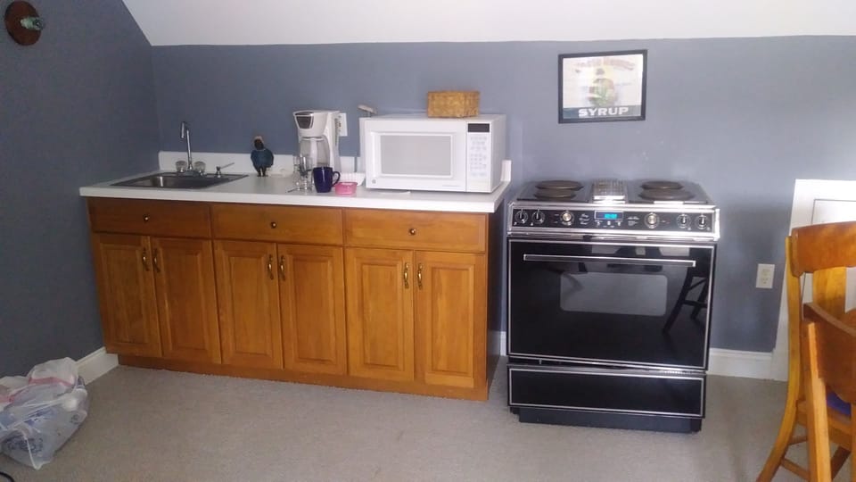 Coffee/tea maker, shared fridge, shared microwave