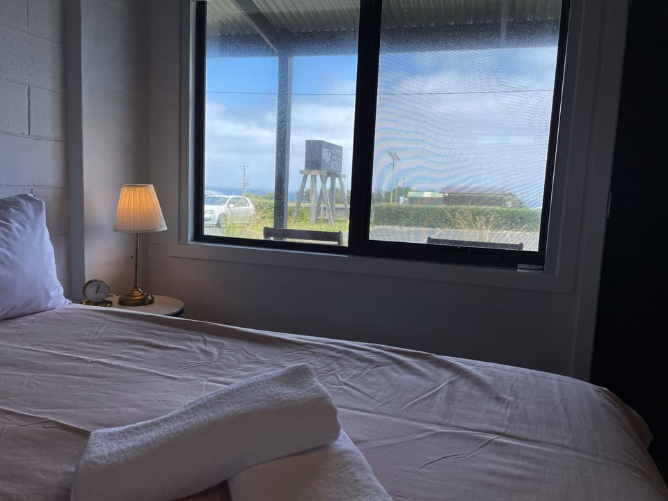 Family Room, 1 Bedroom, Ocean View [1 Queen and Trundle Bed (2 Single Beds)] | Desk, iron/ironing board, free WiFi, bed sheets