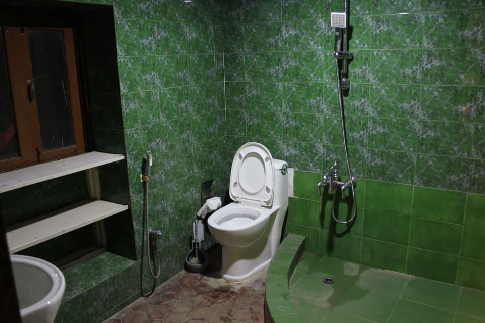Comfort Room | Bathroom | Shower, slippers, towels