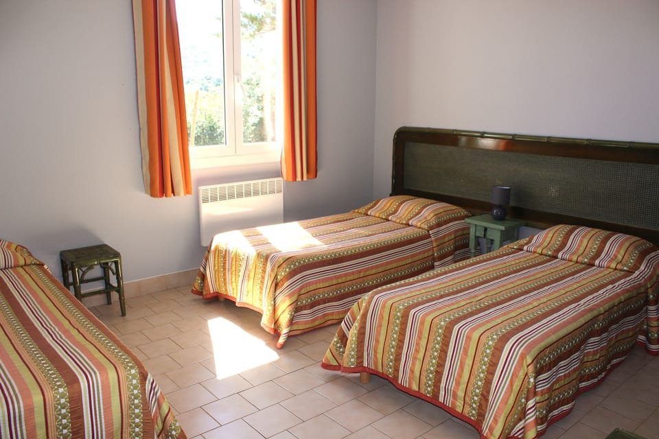 Triple Room | Desk, blackout drapes, soundproofing, cribs (free)