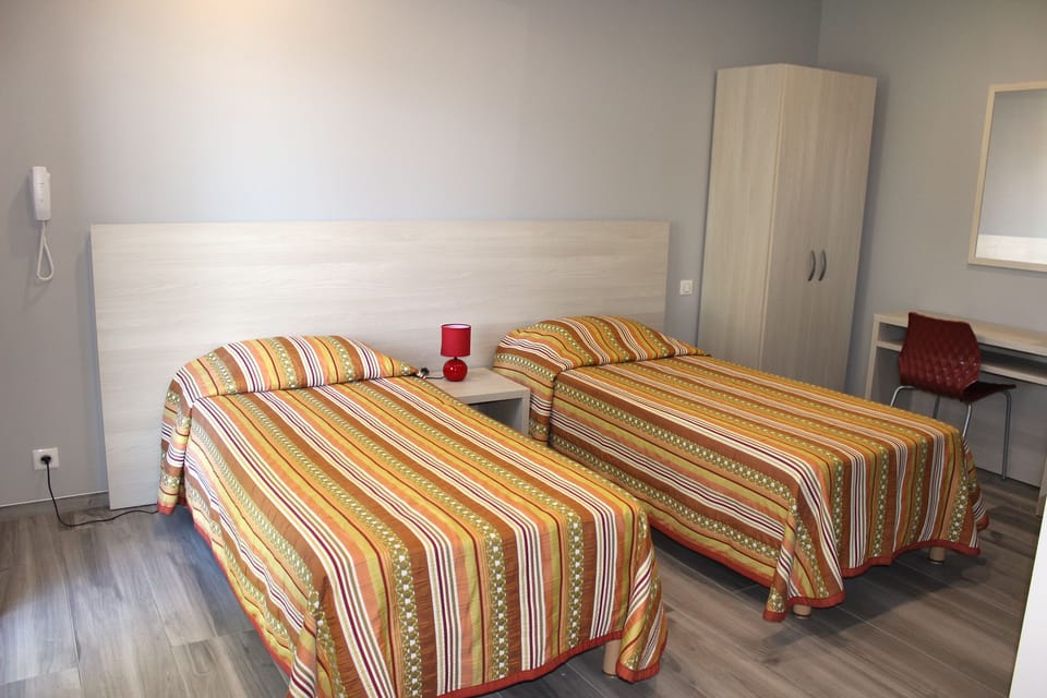 Double or Twin Room | Desk, blackout drapes, soundproofing, cribs (free)