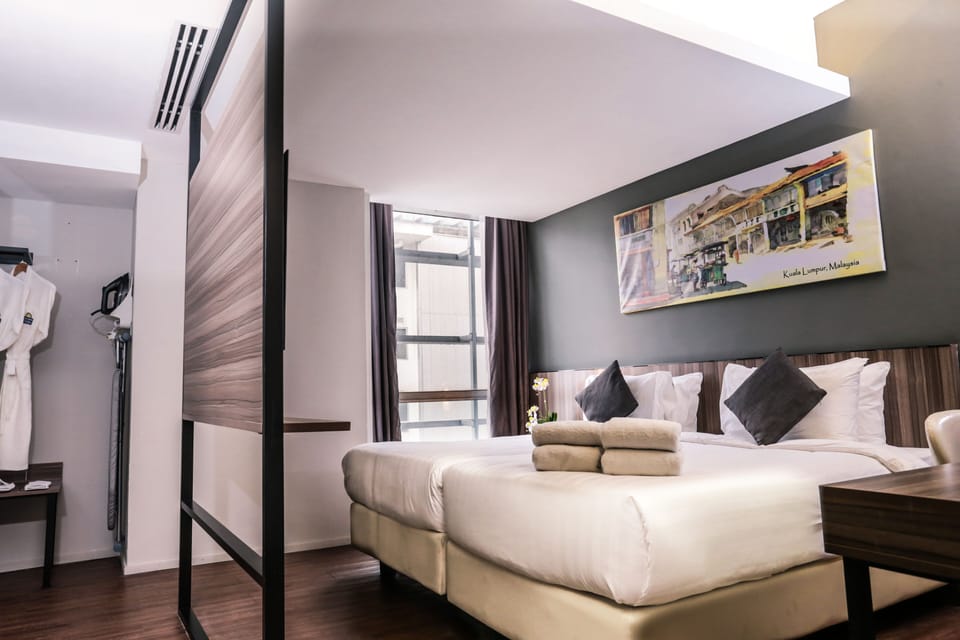 Premium bedding, down comforters, pillowtop beds, minibar