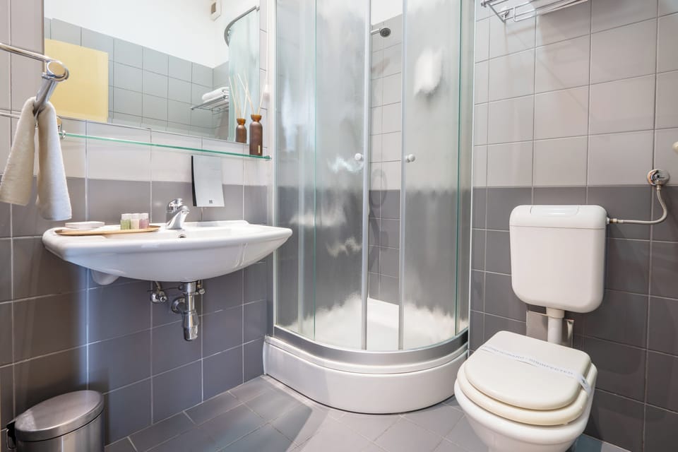 Shower, free toiletries, hair dryer, towels