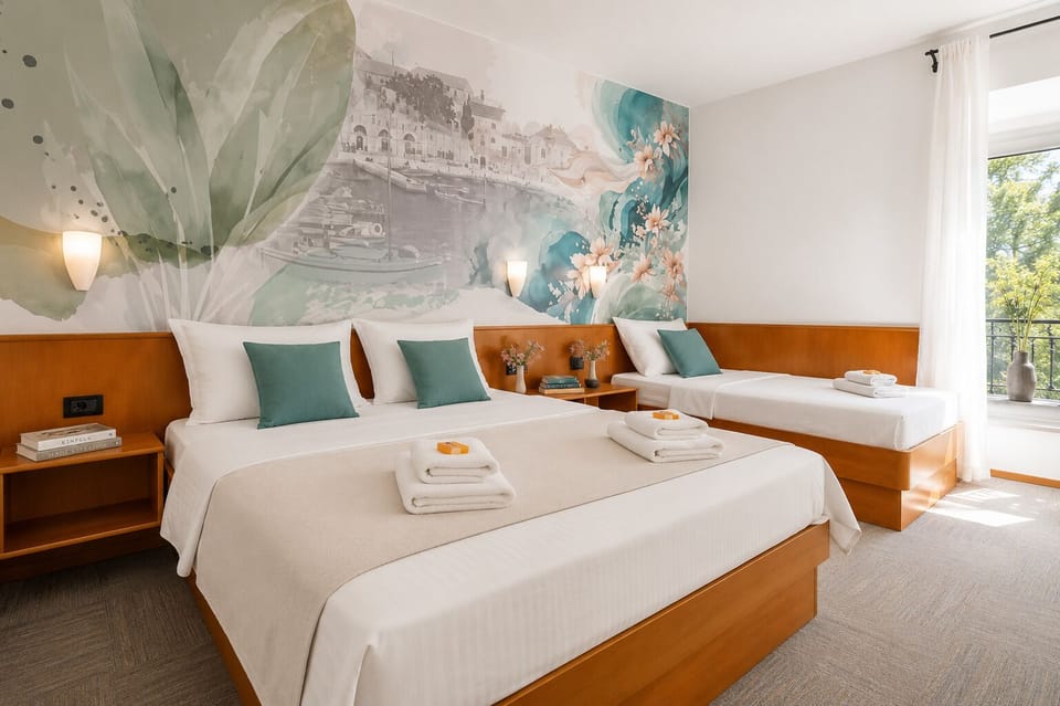 Standard Triple Room, Balcony, Partial Sea View | In-room safe, desk, free cribs/infant beds, free WiFi
