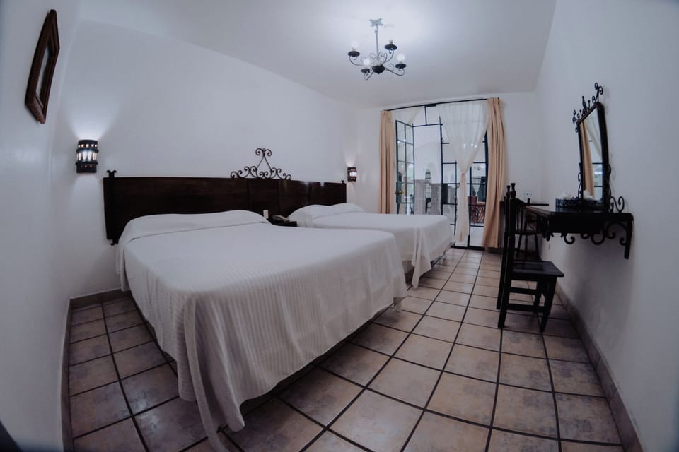 Standard Room, Multiple Beds (No Air Conditioning) | Internet, bed sheets