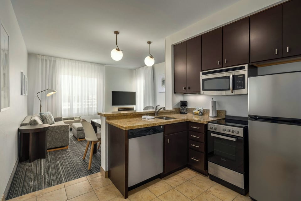 Suite, 2 Bedrooms | Blackout drapes, iron/ironing board, free WiFi, bed sheets