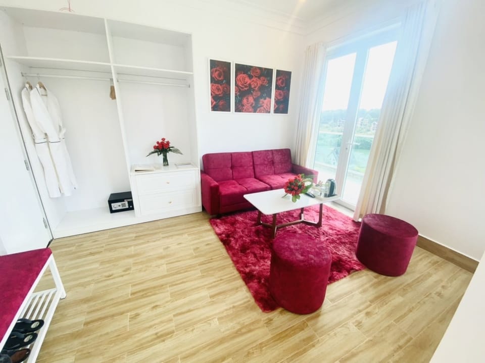 Luxury Twin Room | Living area | 42-inch flat-screen TV with cable channels, TV, fireplace