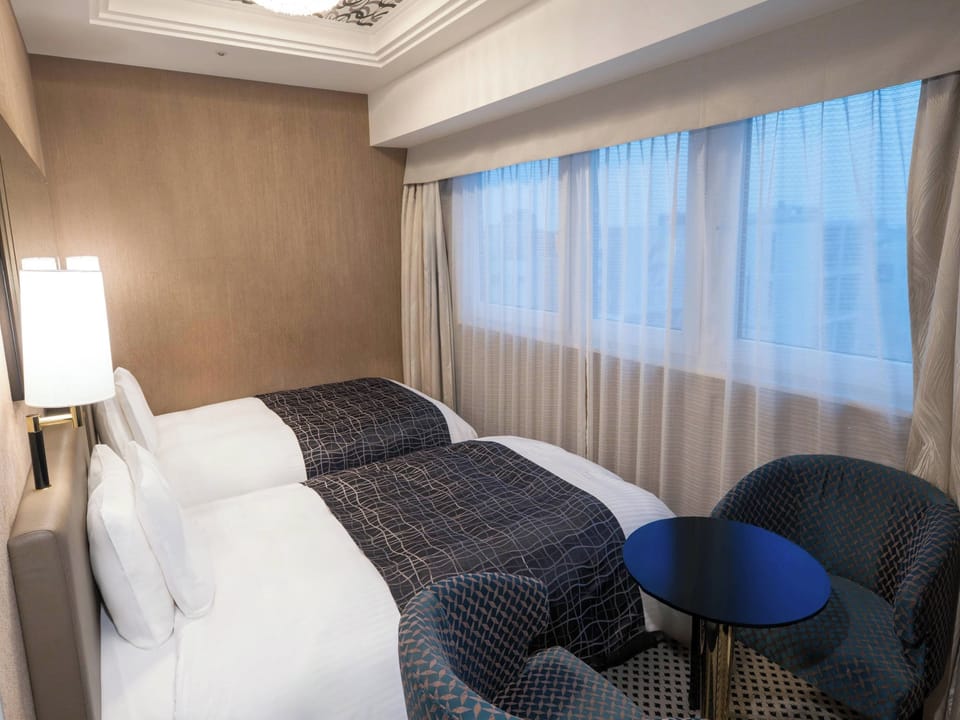 Deluxe Twin Room | Down comforters, desk, free WiFi, bed sheets