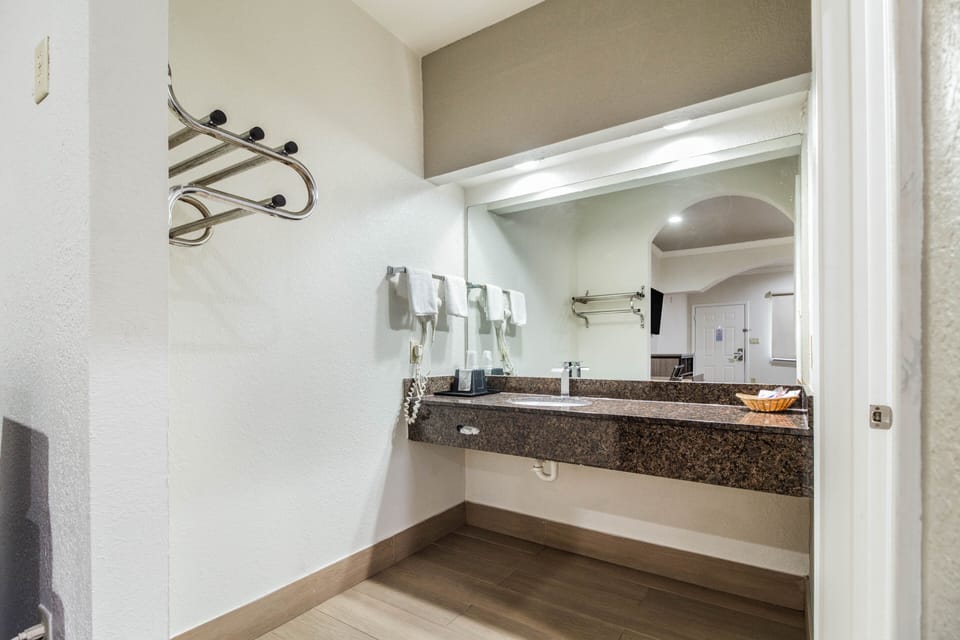 Bathtub, hair dryer, towels