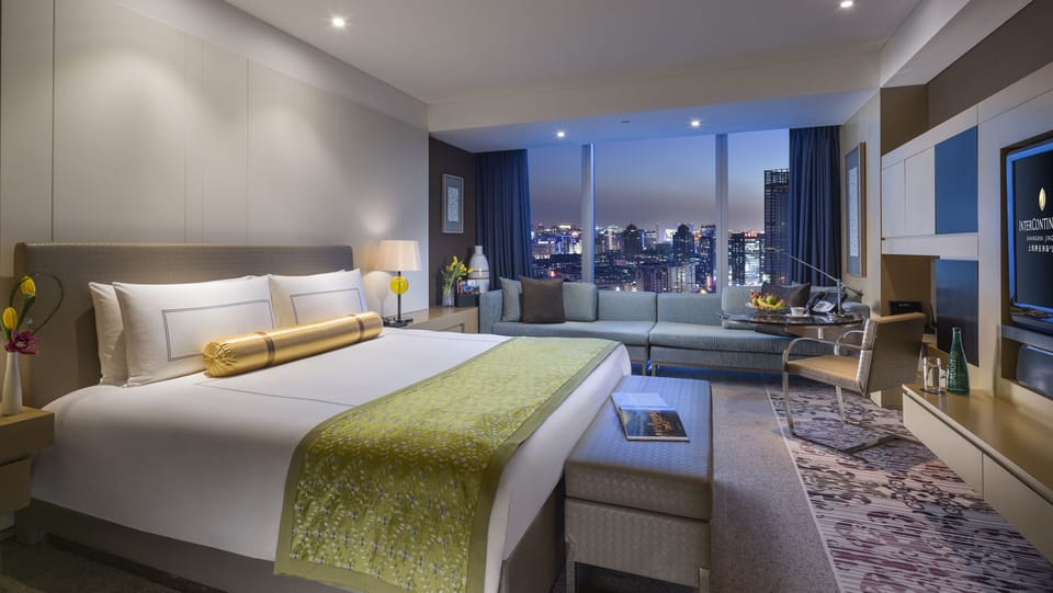 Premium bedding, down comforters, minibar, in-room safe