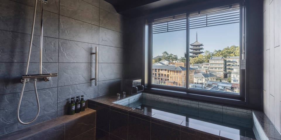Free toiletries, hair dryer, slippers, electronic bidet