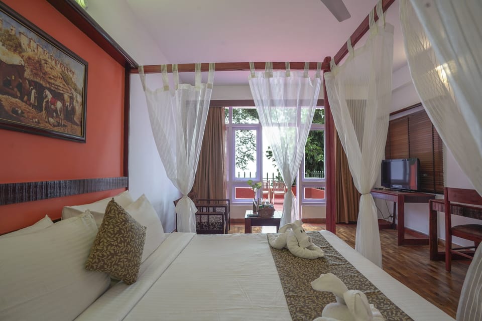 Executive Room | Premium bedding, individually decorated, individually furnished, desk