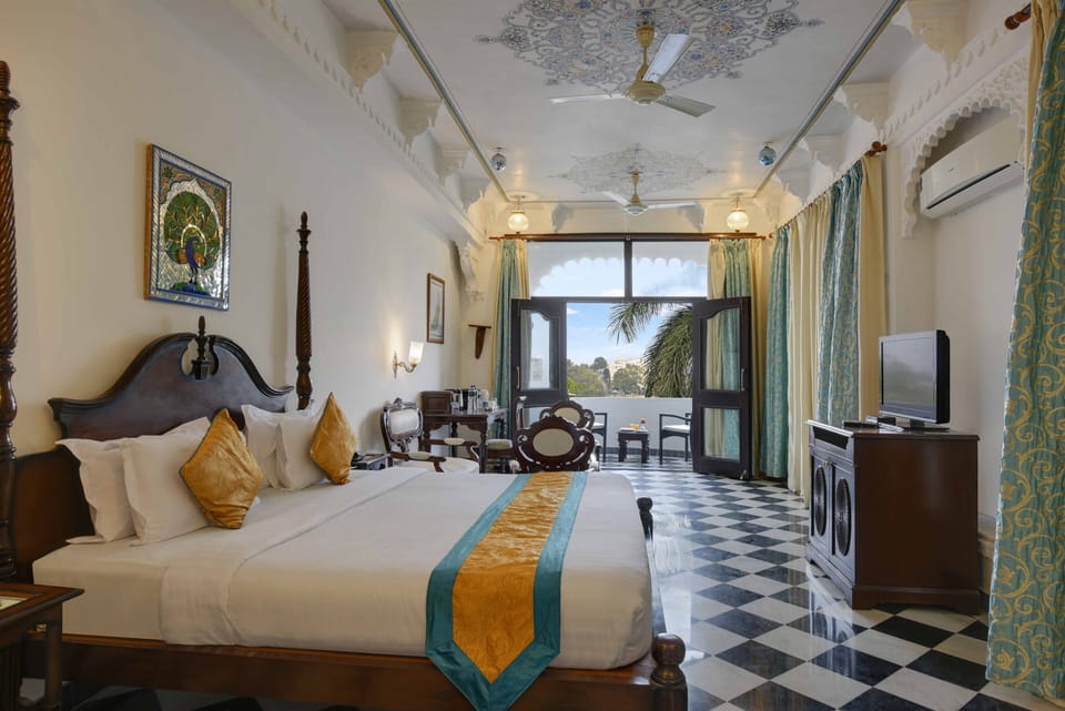 Serene Lake view Suite with balcony | Premium bedding, in-room safe, individually furnished, desk