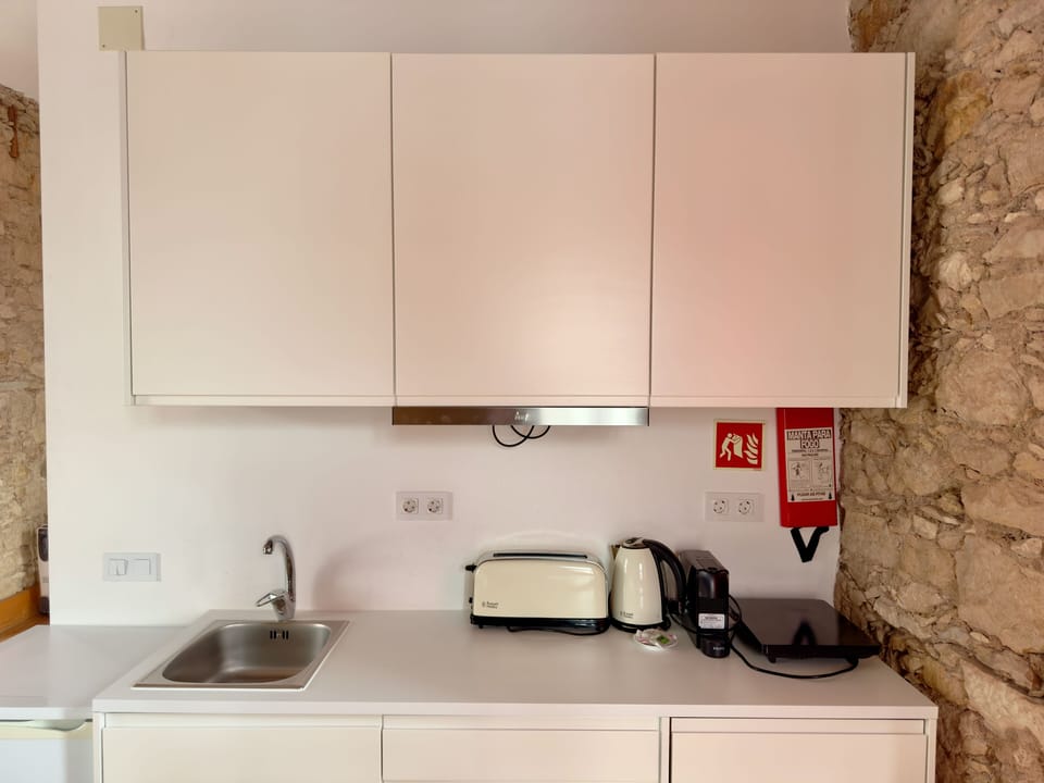 Superior Suite, City View (34) | Private kitchen | Full-size fridge, microwave, stovetop, espresso maker