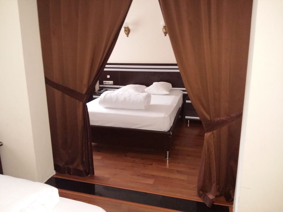 Minibar, desk, laptop workspace, blackout drapes