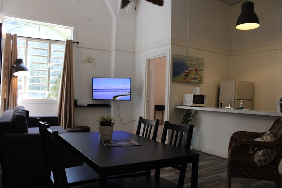 Apartment, 3 Bedrooms | Living area | Flat-screen TV