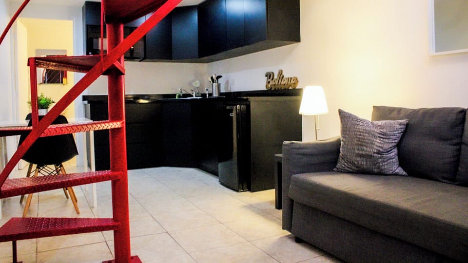 Apartment, Multiple Beds | Living area | Flat-screen TV