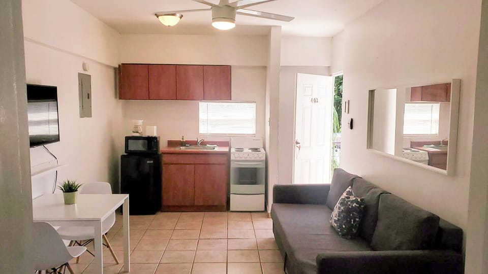 Apartment, 1 Bedroom | Living area | Flat-screen TV