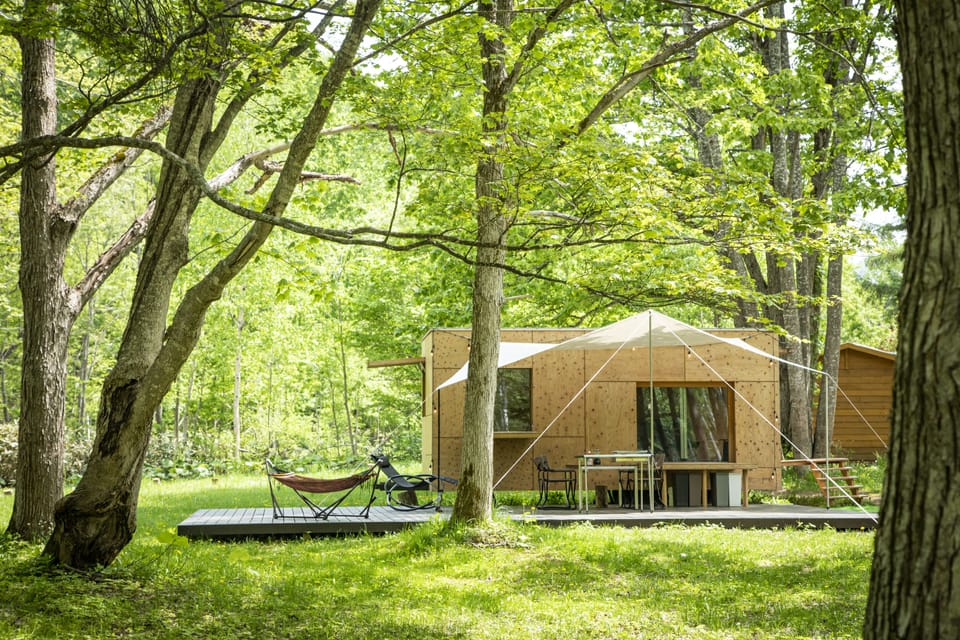 Glamping Cabin | Down comforters, bed sheets